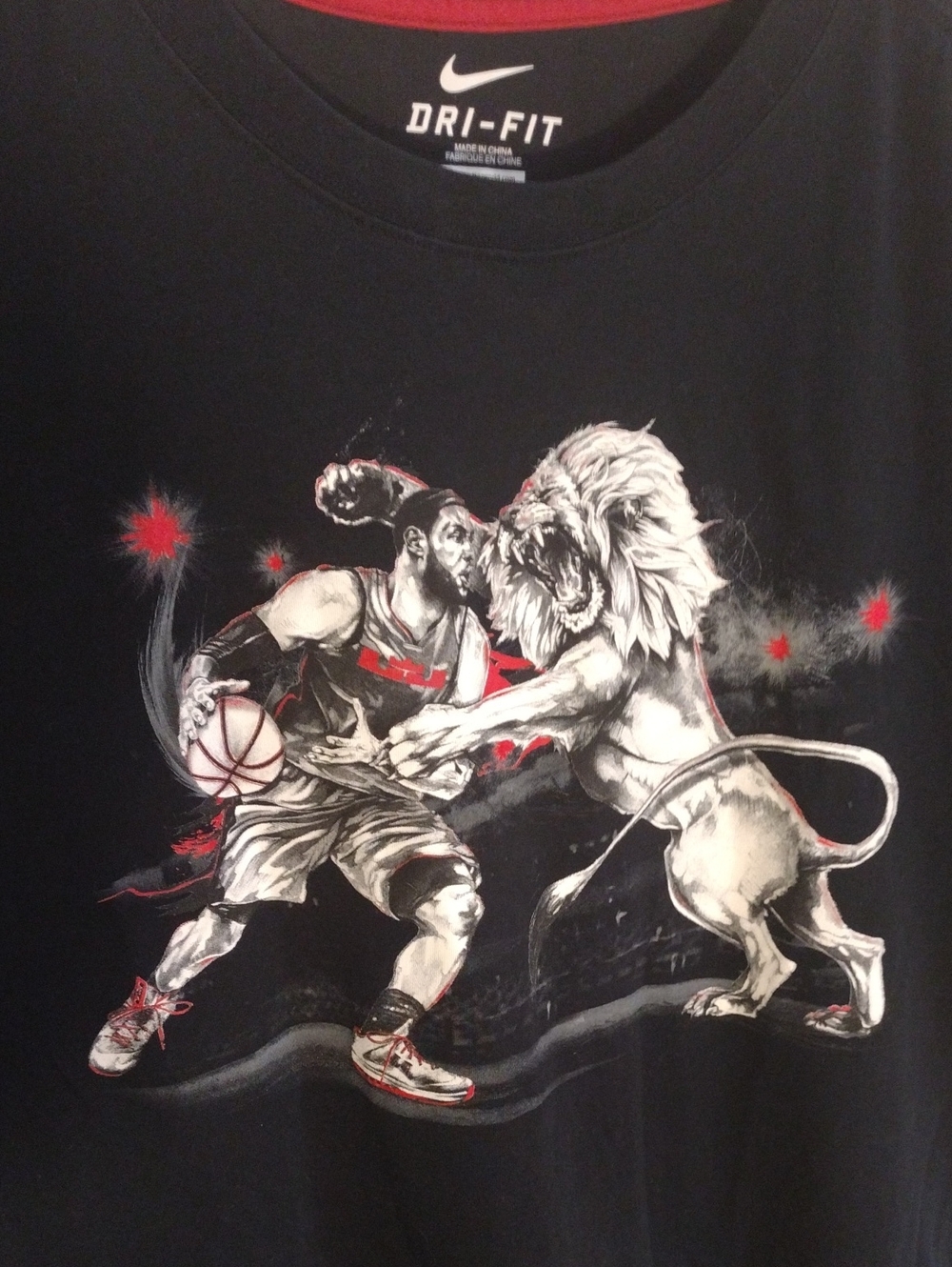 Nike Black Tee with Red and White Basketball vs Lion Graphic